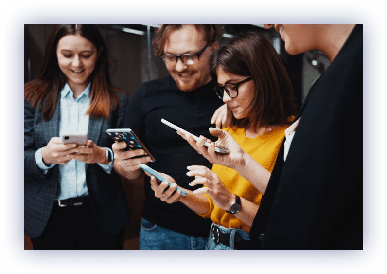 Employees using smartphones at work