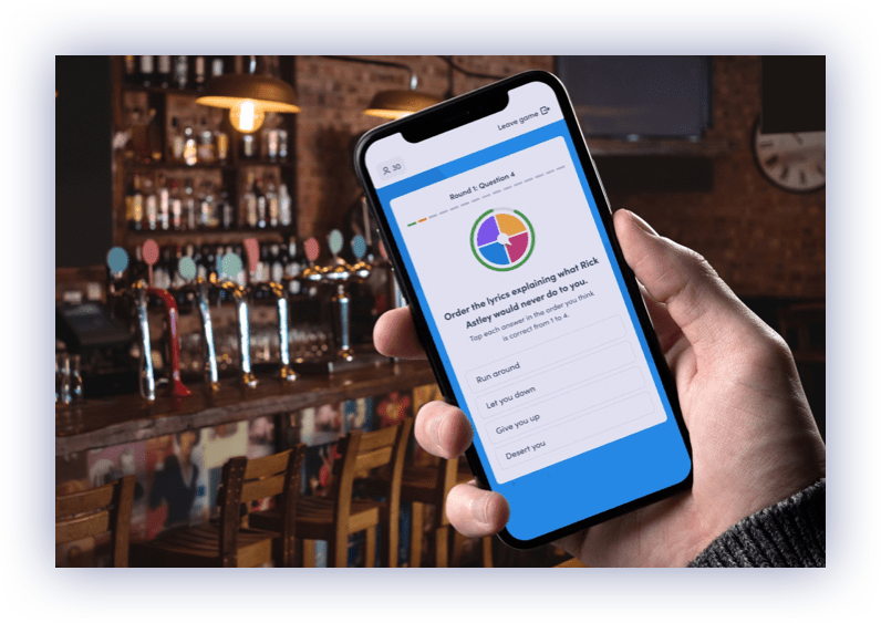 Interactive smartphone pub quiz being played in a pub